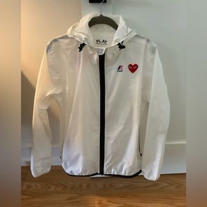 White k way come des garçons jacket in size small.